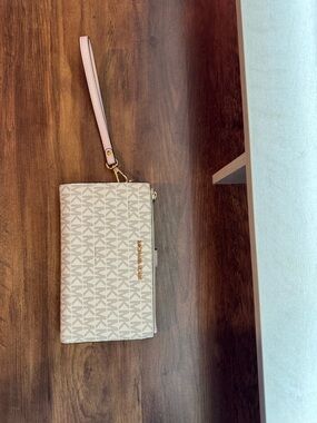 Michael Kors Beige Logo (with Pink Accents) Zip Wristlet with Gold Hardware